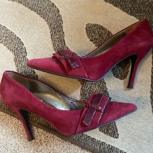 Red suede jeweled bow toe heels